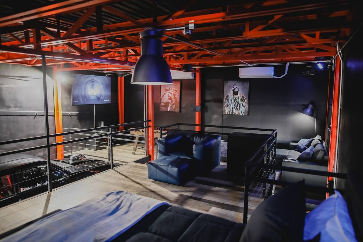 Main lounge with projector screen and AV system